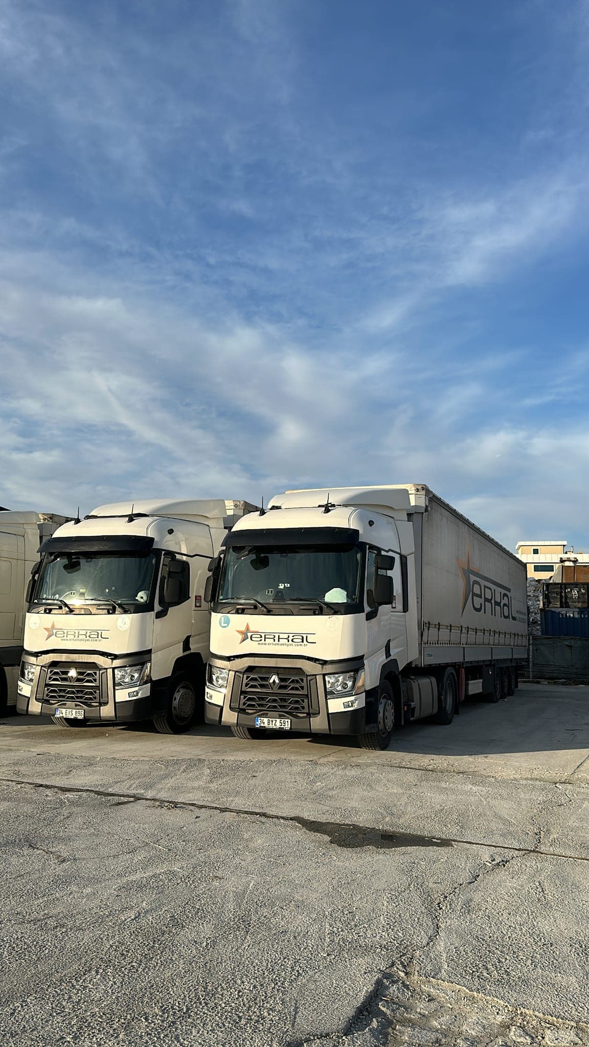 Two Erkal Nakliyat trucks in fleet yard